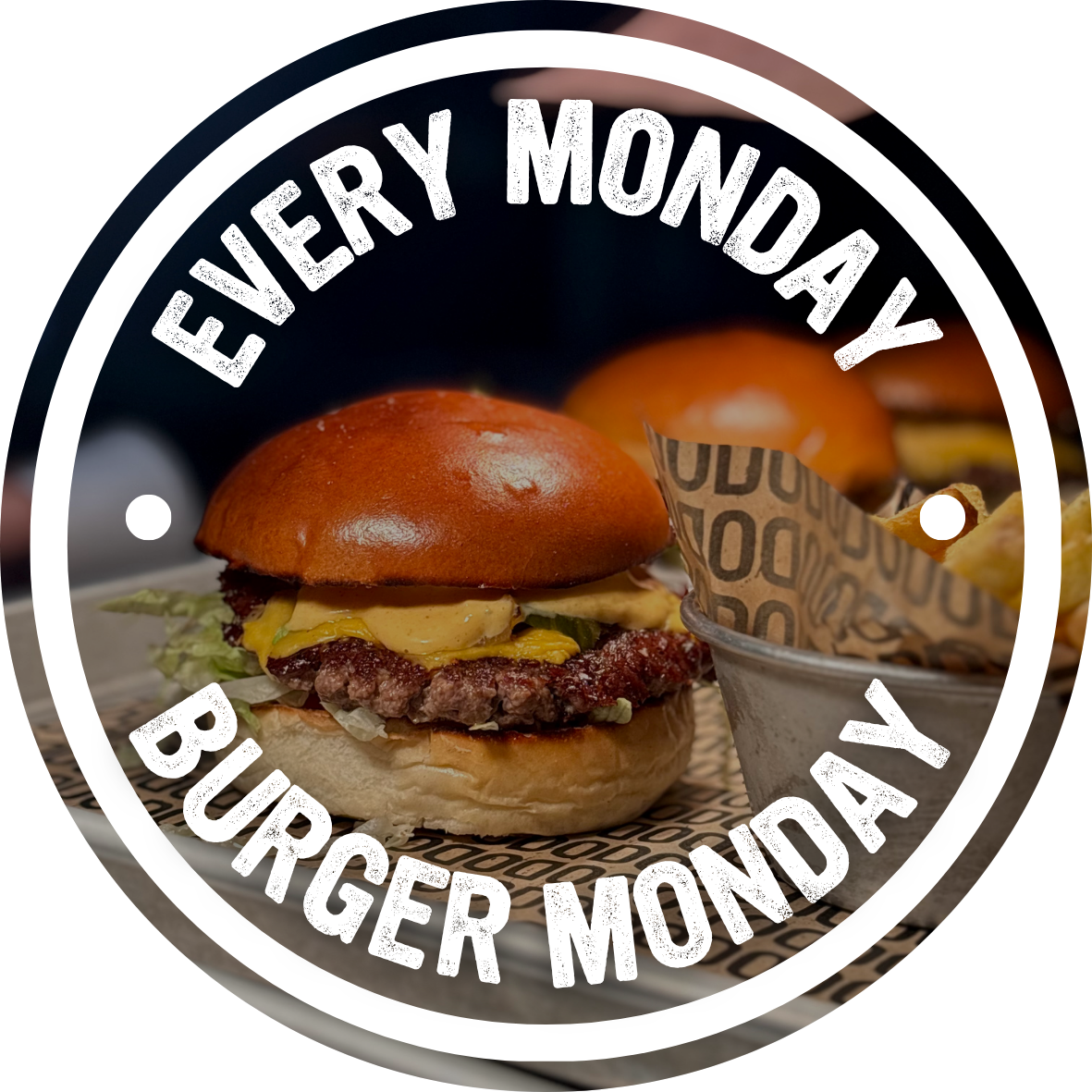 Burger Monday badge over a photo of a cheeseburger, every Monday