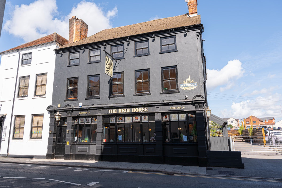 Exterior of The High Horse pub on a sunny day